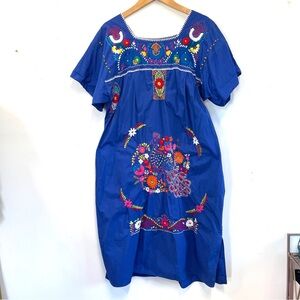 Beautiful blue Mexican embroidered dress with colorful peacock design